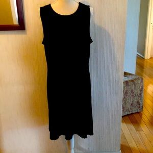 Michael Kors black sexy dress with pleats at bottom of dress. Never worn. XL